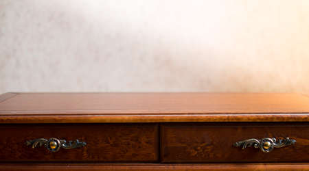 Wooden desk in bright roomの写真素材