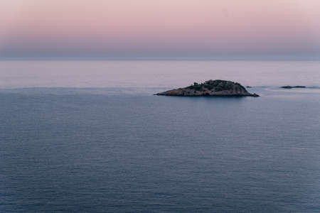 Sunrise over sea and mountains. Rocks and water senery. Turkey landscapeの写真素材