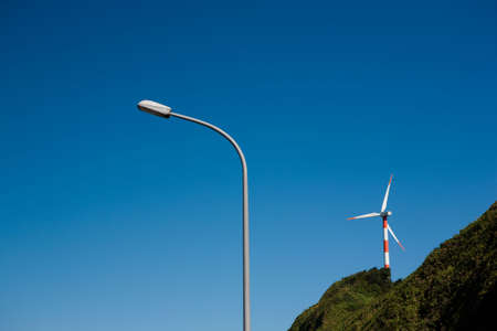 streetlight and windmill, it shows the power generating  and consumption の写真素材