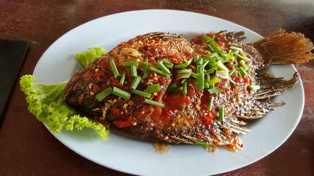 Fish with Chili Sauce lettuce food thaiの写真素材