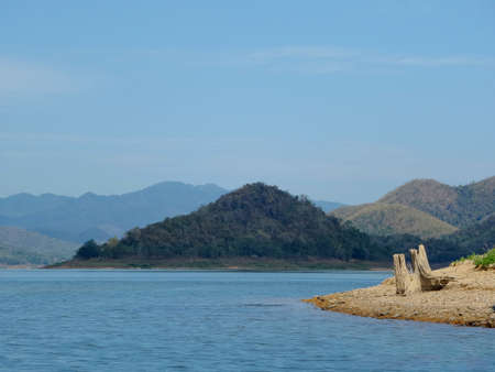 Lagoon timber and mountainの写真素材