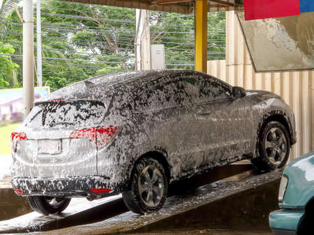 car wash with foam on rampの写真素材