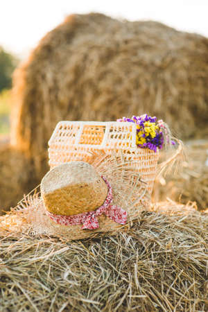 Straw hat and basketの写真素材