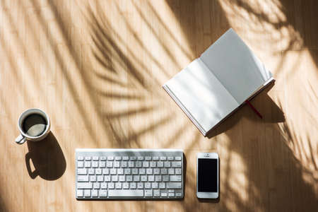 Office desk table of Business workplace top view