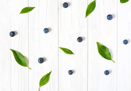 Blueberries on white wooden backgroundの写真素材