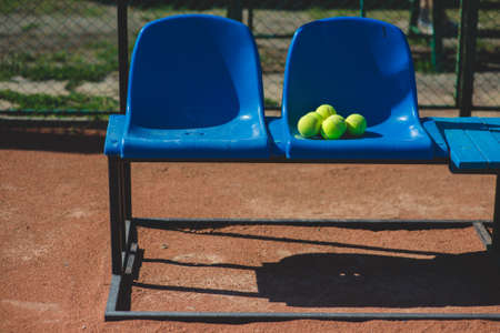 Tennis balls on the seatsの写真素材