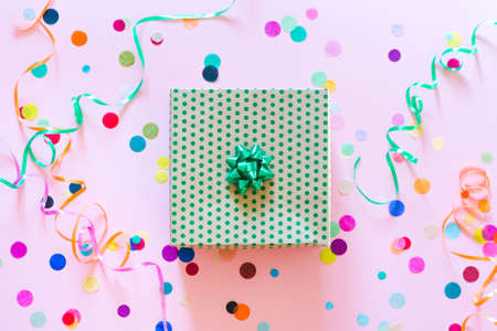 Present box with multicolored confetti. Flat lay style.の写真素材