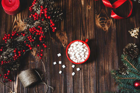 Christmas background with fir tree, hot chocolate and marshmallow. Top view with copy spaceの写真素材