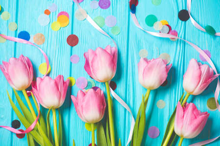 Wooden mint background and pink tulips. Holiday concept, March 8, Mother's Day.の写真素材