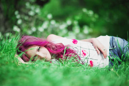Beautiful pretty woman with pink hairの写真素材