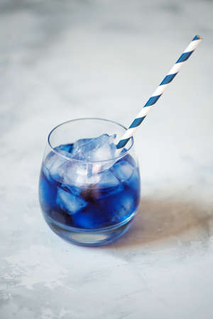 Butterfly pea drink with ice in glassの写真素材