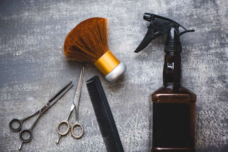 Hairdresser tools on a gray backgroundの写真素材