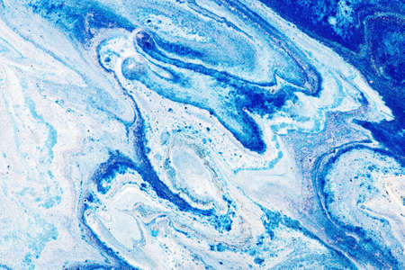 Abstract colorful background. Mixing paints. Modern art. Marble texture