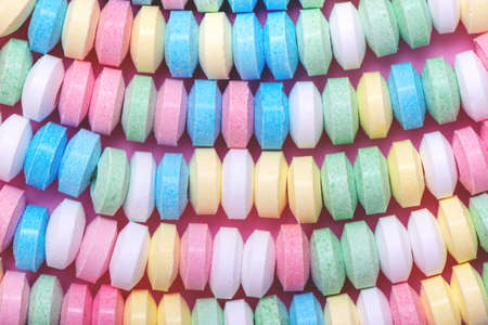 Pastel background made of candy necklace.の写真素材