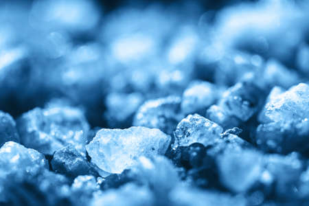 Blue crystals of sea salt close-up background.の写真素材