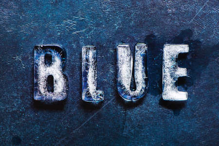 Word "Blue" made of real ice letters.の写真素材