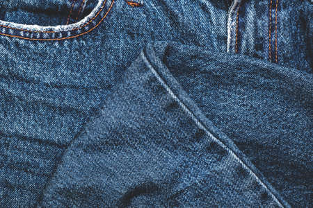 Close up view of classic blue jeans texture background.の写真素材