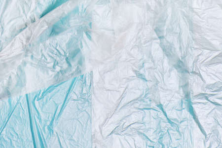 Plastic bags texture on blue background. Zero waste conept.