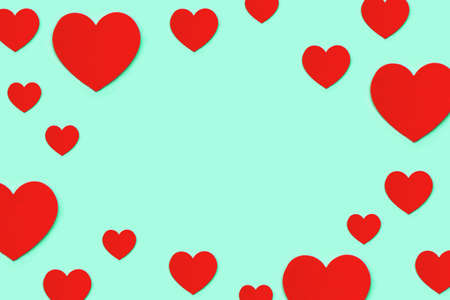 Frame made of red decorative hearts on a blue background. Valentine's day background.