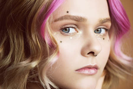 Beautiful girl with pink hair.