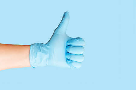 Hand giving thumbs up.の写真素材