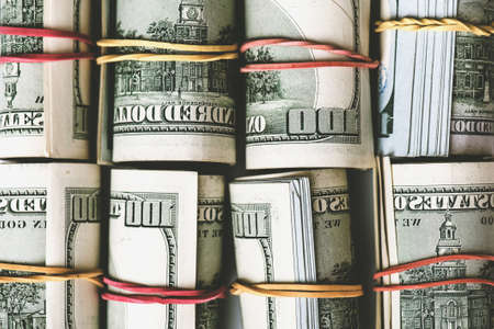 Rolls of dollar banknotes.