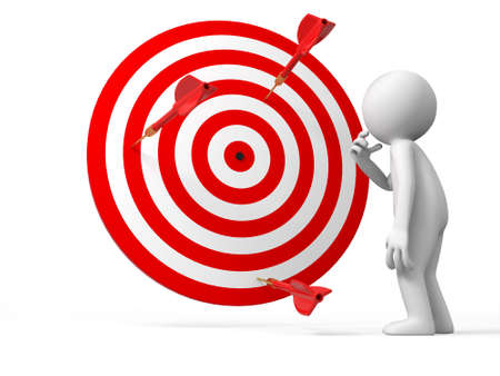 Darts target a people is standing in front the dartboard thinkingの写真素材