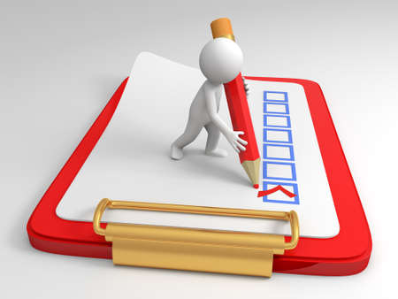 A person to markwith a pencil on the broadの写真素材