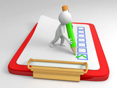 A person to markwith a pencil on the broadの写真素材