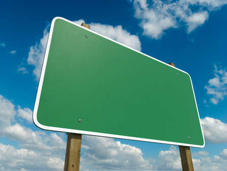 Blank Green Road Sign Isolated on a sky Backgroundの写真素材