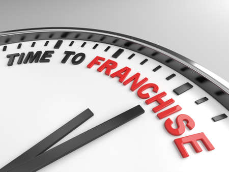 Clock with words time to franchise on its face Clock with words time to franchise on its face