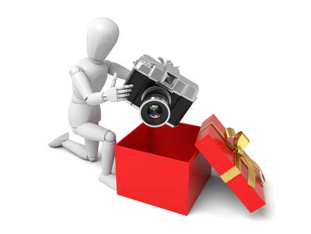 A 3d people keeping camera into a gift box. 3d image. Isolated white backgroundの写真素材