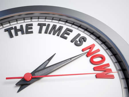 Clock with words The Time is Now on its faceの写真素材