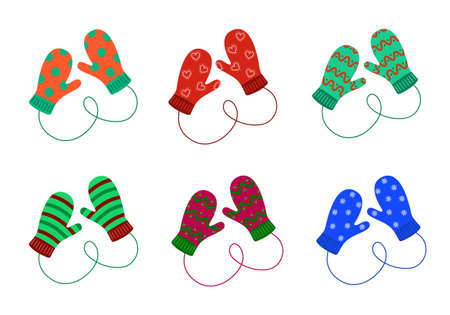 Pair of knitted mittens set. Woolen christmas mittens with different patterns isolated on the white background. Vector illustration.のイラスト素材