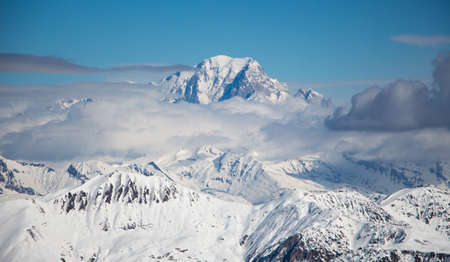 Mont blanc sunset view spectacular surrounding clouds snowy mountain from Mont Vallon Meribel 3 valleesの写真素材
