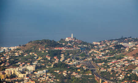 Beautiful madeira coastline with the capital Funchal and the sea and horizon. Perfect view from...