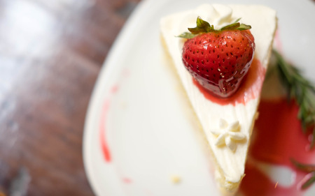 Close up strawberry cake,Holiday desserts require strawberry cakes. With strawberry juice sprinkleの写真素材
