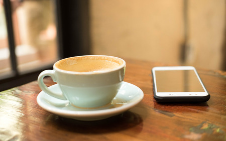 Close up,Morning break with hot latte coffee Helps to relax from work.の写真素材