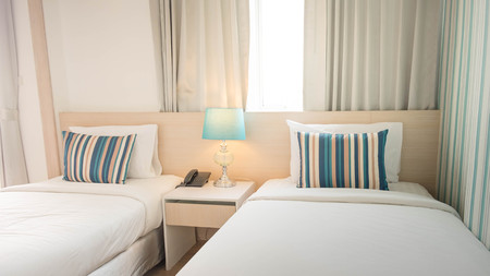 The Bedroom in hotel so beautiful.first impression i will to sleep in twin bed.の写真素材