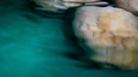 The rock fell into the water causing shakingの写真素材