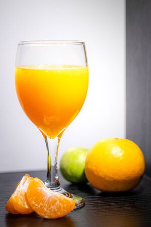 Soft Focus,Close-up shot, squeezed orange juice with lemon juice separating the perfect flavor, citrus scent of lemon, squeezed orange juice, lemon orange juiceの写真素材