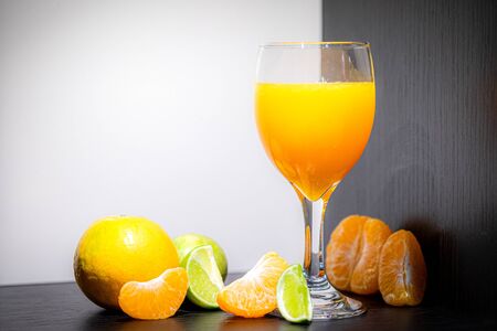 Soft Focus,Close-up shot, squeezed orange juice with lemon juice separating the perfect flavor, citrus scent of lemon, squeezed orange juice, lemon orange juiceの写真素材