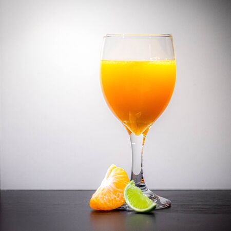 Soft Focus,Close-up shot, squeezed orange juice with lemon juice separating the perfect flavor, citrus scent of lemon, squeezed orange juice, lemon orange juiceの写真素材