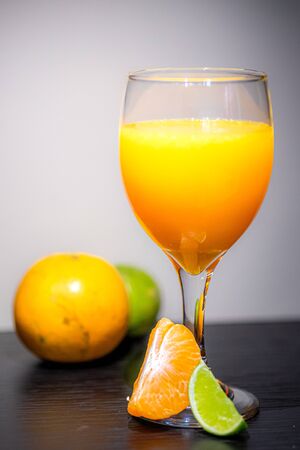 Soft Focus,Close-up shot, squeezed orange juice with lemon juice separating the perfect flavor, citrus scent of lemon, squeezed orange juice, lemon orange juiceの写真素材