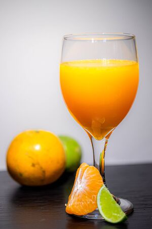 Soft Focus,Close-up shot, squeezed orange juice with lemon juice separating the perfect flavor, citrus scent of lemon, squeezed orange juice, lemon orange juiceの写真素材