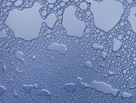 drops on glass の写真素材