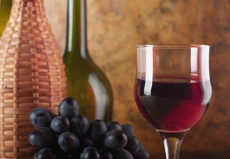 bottle with red wine and glass の写真素材