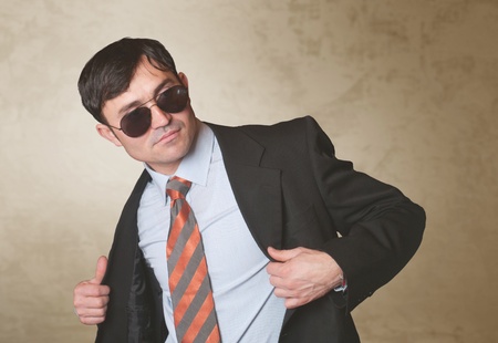 Portrait of handsome stylish man in elegant black suit の写真素材
