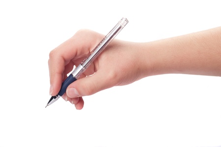 young woman's hand is writing の写真素材