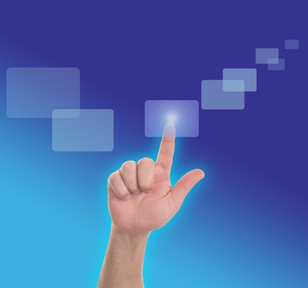 Hand pressing touchscreen button の写真素材